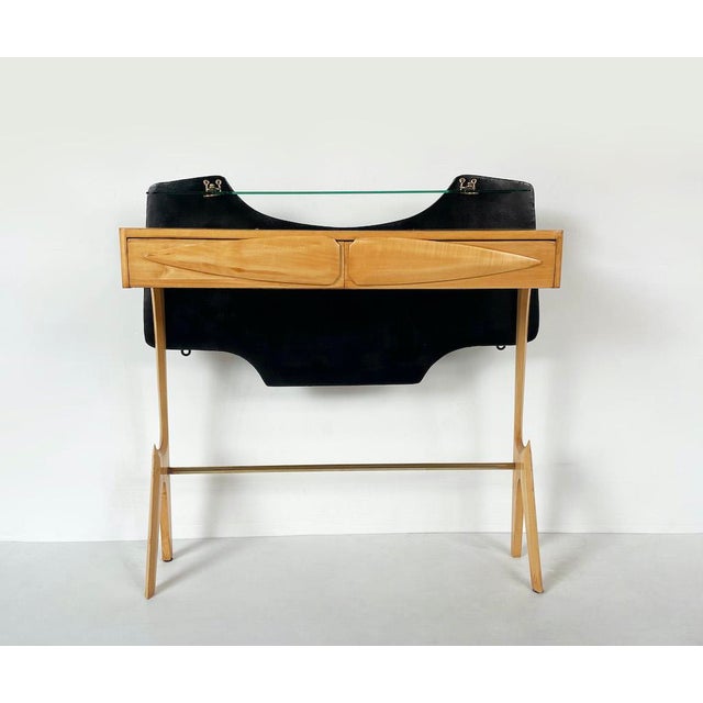 Unique 1950s vintage console table, featuring an organic design inspired by the style of Ico Parisi. Made entirely of...