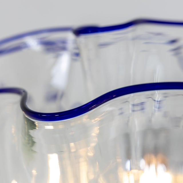 An unusual "Fazzoletto" Italian Art Glass table lamp. Clear glass with cobalt blue accent edges.