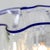 An unusual "Fazzoletto" Italian Art Glass table lamp. Clear glass with cobalt blue accent edges.