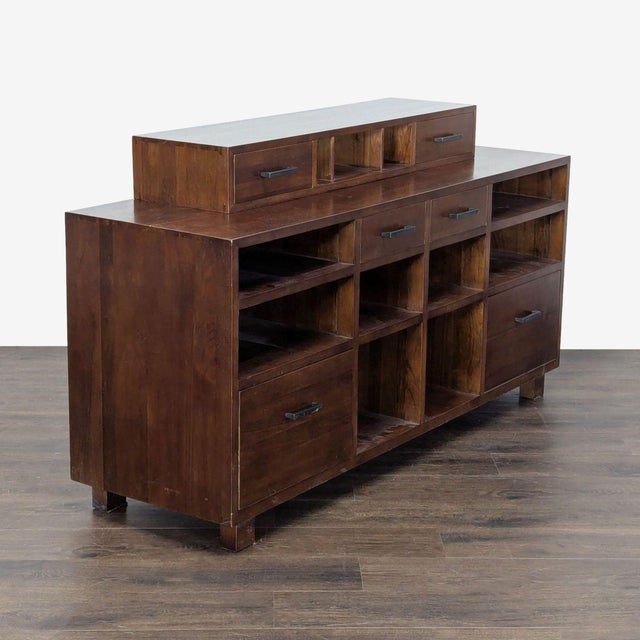 Solid wood, with dovetail joints. There are two top drawers, and two file drawers that can fit either letter or legal...