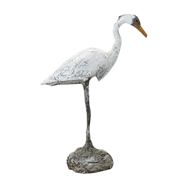 Dimensions: 37 ½” H x 11” W x 24 ½” D This whimsical hand-painted, hand-sculpted representation of a standing egret will...
