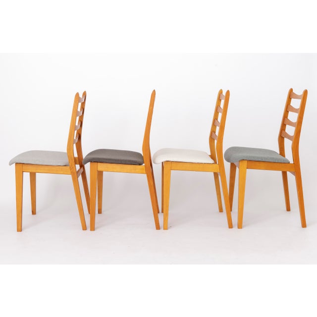 Set of 4 Vintage Beech Dining Chairs, Germany, 1960s A beautiful set of four vintage dining chairs crafted from solid...
