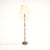 A stunning antique onyx marble and gilt metal floor lamp. This was made in England, it dates from around the 1930’s. The...