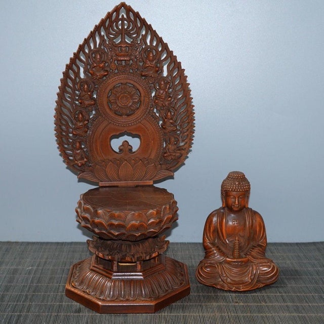 This is a meticulously hand-carved Chinese Buddha statue made from premium Boxwood (Huangyangmu), known for its dense...