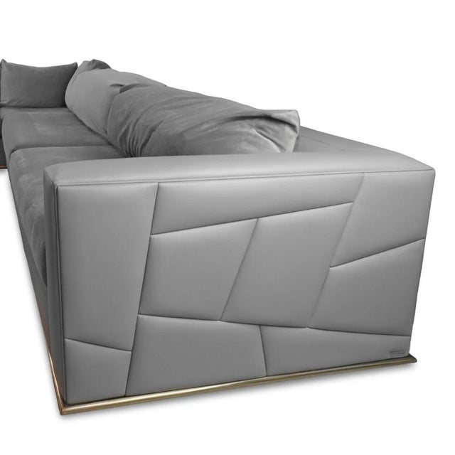 The Elan R007 Sectional Sofa from Nathan Anthony is a bold contemporary statement defined by its architectural detailing...