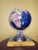 Globemaster Replogle world globe, approximately 12 inches in diameter, produced in the 1980s–1990s. The globe features...