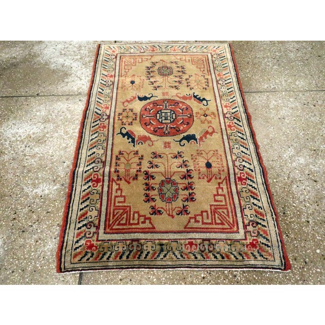 An antique Indian Lahore throw rug handmade during the Early 20th century. Measures: 2' 4" x 3' 10"