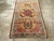 An antique Indian Lahore throw rug handmade during the Early 20th century. Measures: 2' 4" x 3' 10"
