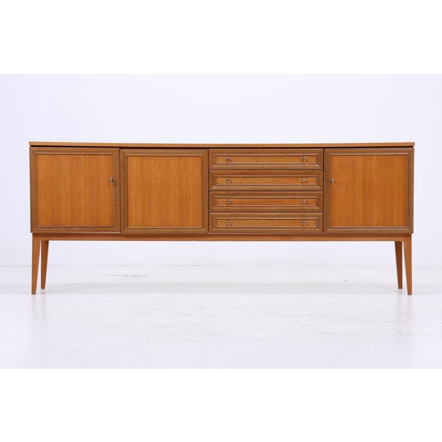 Beautiful walnut sideboard from the 1960s with compartments & drawers High-quality workmanship * Material: Walnut * 2...