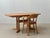 A characterful vintage dining table from design + handwerk, crafted from alder wood. The table combines a clean,...