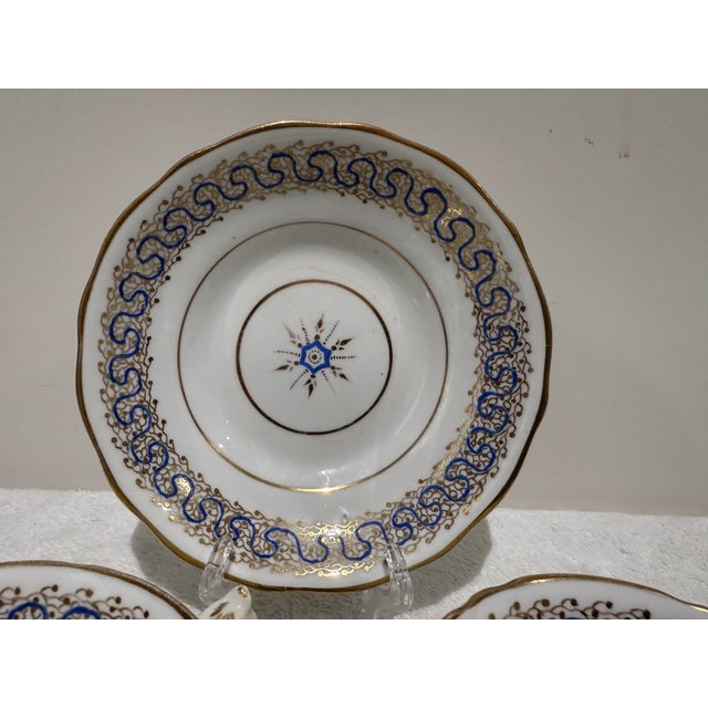 There are total 3 pieces, 2 teacup and one saucer. Approx. measurements: tea cup 2" height and 4 1/2" rim to handle long....