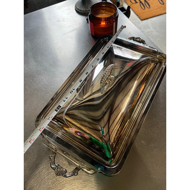 Up for consideration is a beautiful vintage silver metal footed serving dish with a matching lid. This would look lovely...