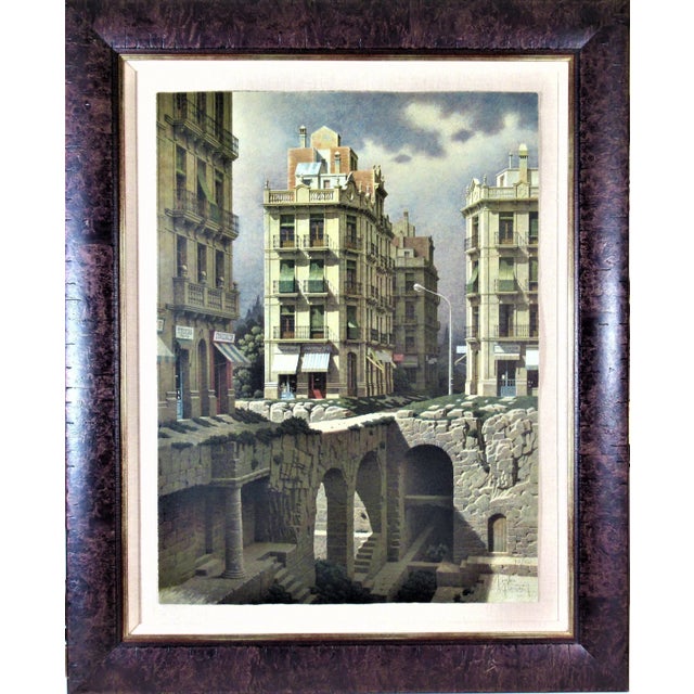 This artwork titled "Les Fondations" c.1980 is an original color lithograph by noted Spanish surrealist artist Arnau...