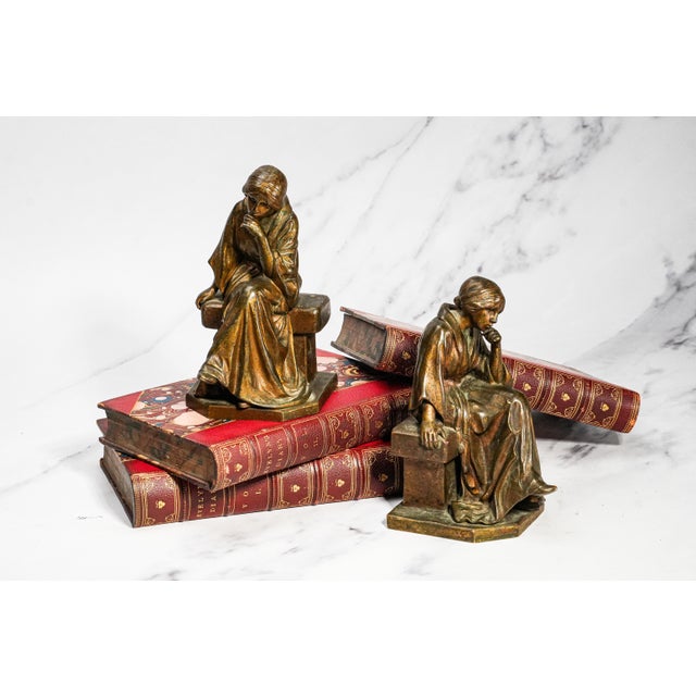 An exceptional and unusually substantial pair of circa 1915 bronze bookends titled “Pensive,” by Italian sculptor Clemente...