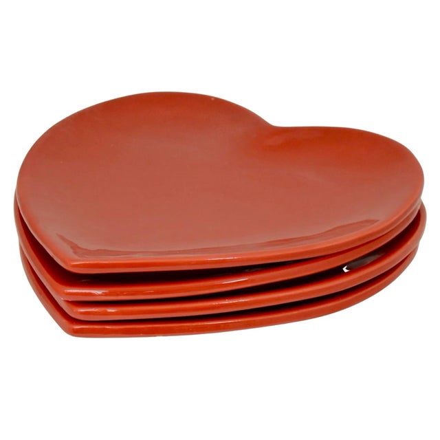 Set of four vintage red ceramic heart eight inch dessert plates or trays. A lovely Valentine's Day set and a beautiful pop...