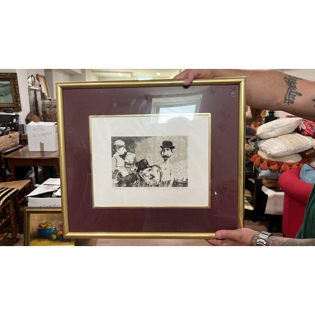 A whimsical, narrative black-and-white etching featuring characteristically stylized figures in top hats and vintage...