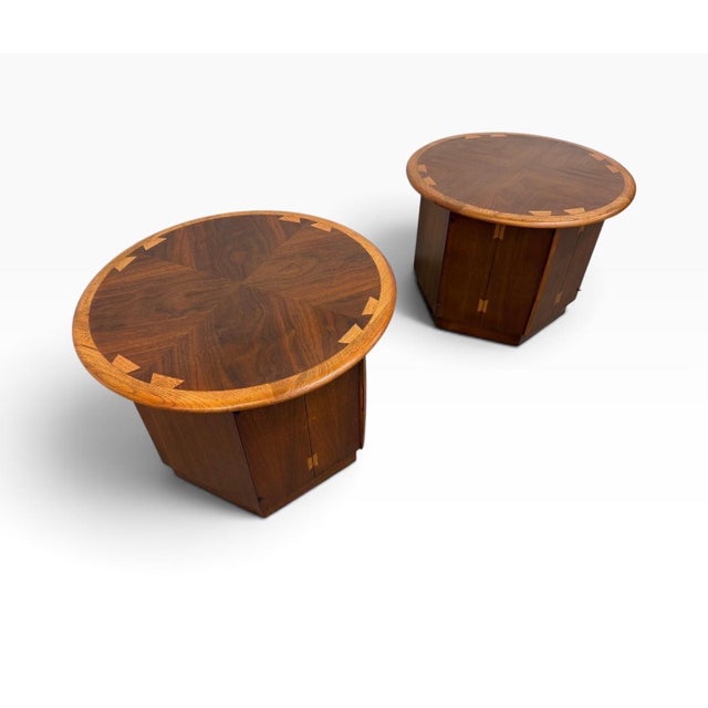 This beautiful pair of Mid-Century Modern Lane Acclaim round walnut side tables dates to the 1960s and showcases one of...