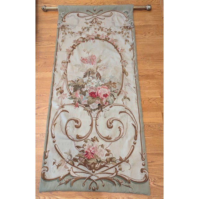 This particular tapestry is likely from the mid 1920's - 1940's handwoven in Belgium or France. The fabric on the back was...