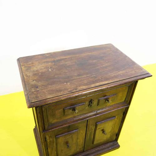 Antique wooden sideboard featuring an upper drawer and panelled doors.