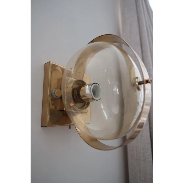 Beautiful Mid-century Italian glass and brass wall light. This piece is a work of art in itself, and would look beautiful...