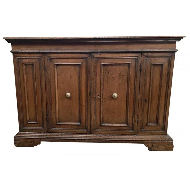 A stunning 18th century Credenza from the Lombardy region of Italy. Soundly constructed from handsome walnut with 2 doors,...
