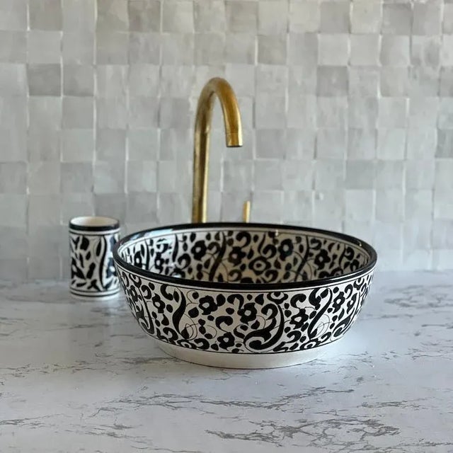 1) Elevate the Beauty of your bathroom with our Sink. This ceramic vessel sink is skillfully handcrafted by our artisans...