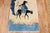 One of a kind Late 20th century Chinese rug with a shepherd riding on a mule.