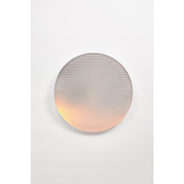 Conventional mirrors are known for replicating their surroundings, presenting a faithful reflection of the world as we see...