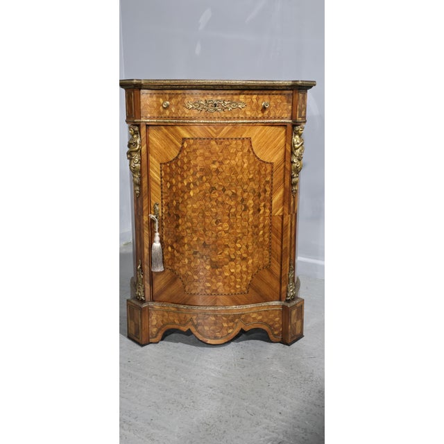 Super quality French parquetry Tullipwood and Satinwood serpentine side cabinet, two shelves, single full width drawer,...