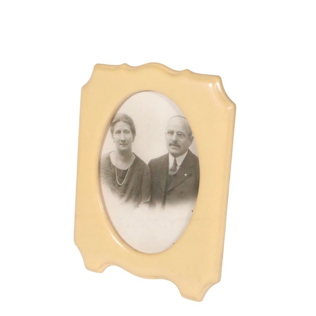 Vintage Art Deco celluloid easel form picture frame, with period photo of someones relatives. The frame is in good,...