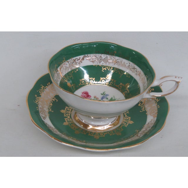 This gorgeous set of a tea cup and saucer is marked on the bottom " Royal Standard ", fine bone china, England. There is...