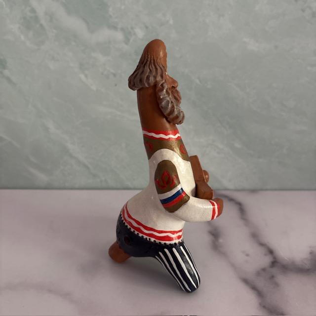 Amazing handmade and hand-painted mid-century flute whistle. Made of ceramic pottery. Depicts an older bearded gentleman...