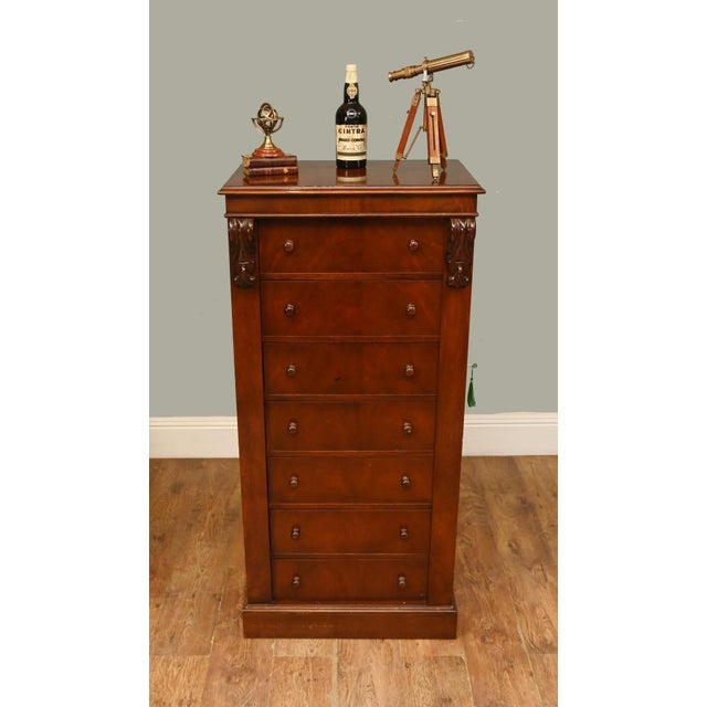 A handsome antique william iv mahogany wellington chest, crafted in richly figured mahogany and displaying the bold yet...