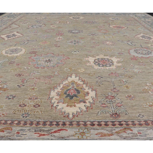 Modern Large All-Over Designed Tabriz With a Yellow-Taupe Background and Muted Colors For Sale - Image 3 of 12