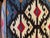 This striking vintage accent pillow features a handwoven wool kilim front displaying traditional geometric craftsmanship....