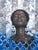 Journey to the Grey Land by Ifeoluwa Alade | Acrylic on canvas Portrait of a woman with glasses. For Sale