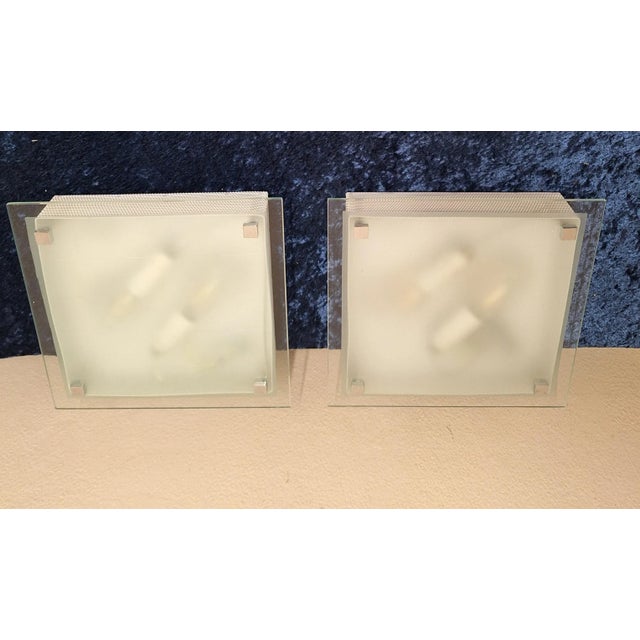 Vintage Wall Lamps by Brilliant, 2003, Set of 2, in Very Good conditions. Designed from 2000 This piece has an attribution...