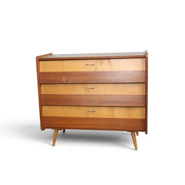 A well-crafted 1950s Swedish shoe cabinet in a warm combination of beech and teak — a practical and handsome piece of...