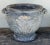 Large stately acanthus leaf urn atop matching pedestal. Hole in bottom of urn allows for drainage. Dimensions given are...