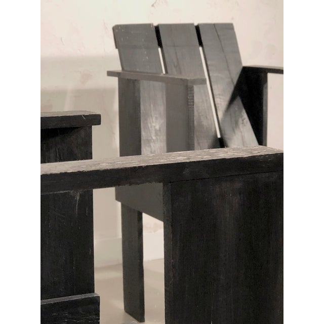 a set of 4 stackable chairs, post-modernist, constructivist, memphis, complex geometric structures in metallic gray square...