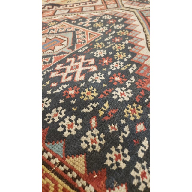 Antique Shirvan rugs of the Caucasus are known to enthusiasts as small pieces with finely detailed all-over repeat...