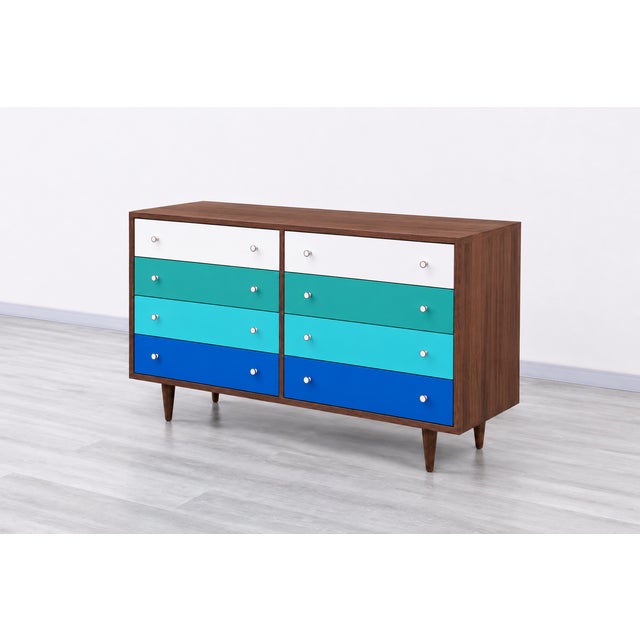 Mid century modern style walnut/multi colored dresser in Manner og Glenn of California. Well made. Walnut with white,...