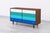 Mid century modern style walnut/multi colored dresser in Manner og Glenn of California. Well made. Walnut with white,...