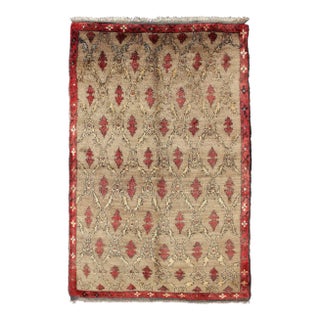 Turkish Tulu With Repeating Tribal Motifs on a Sand Field Surrounded by a Red Border For Sale