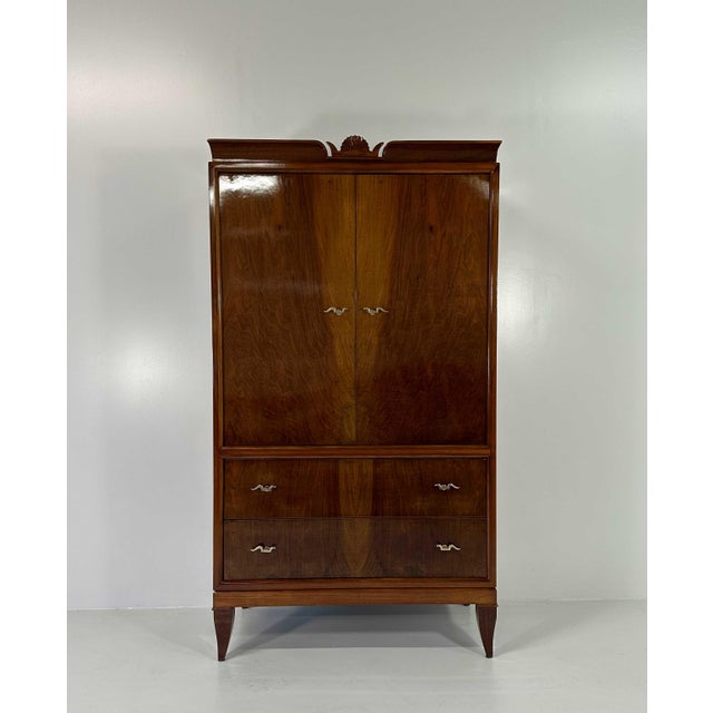 This wardrobe was produced in Italy, in Cantù (small village in the north of Italy, next to Milan), by Paolo Lietti &...