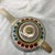 This is a vintage Franciscan Ventura Teapot featuring a speckled tan base and a colorful geometric tribal pattern with...