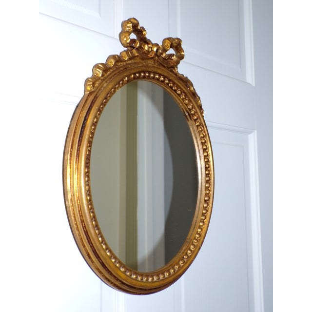Italian Vintage Italian Florentine Gilded Oval Mirror Ribbon Bow Accent Italy For Sale - Image 3 of 13
