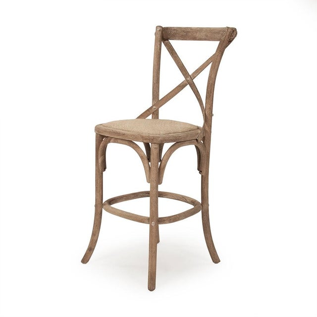 The Parisienne Cafe Counter Stool from Zentique brings the classic French cross-back bistro chair to counter height at...