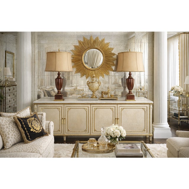 Offering a pair of vintage Neoclassical solid mahogany and brass table lamps made by Bombay Co. with vintage shades...