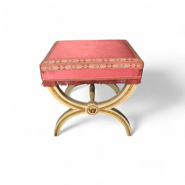 Experience the timeless elegance of this pair of Louis XVI-style gondola stools, crafted in France during the early 20th...